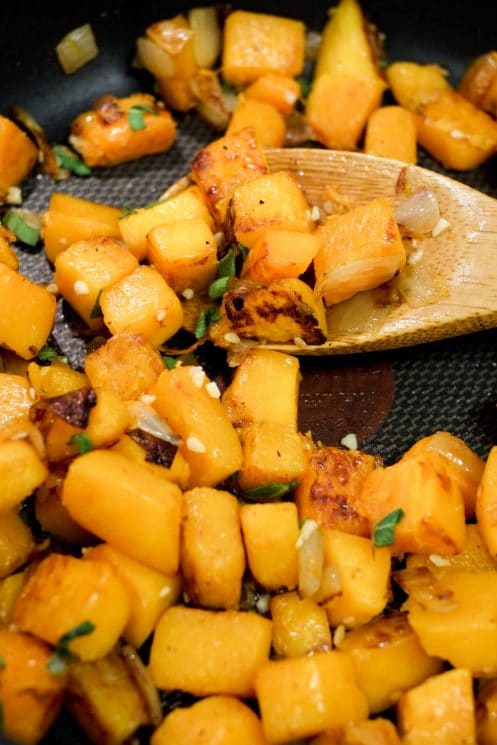 Sauteed butternut squash, onions, and fresh sage for a healthy and delicious sauce!