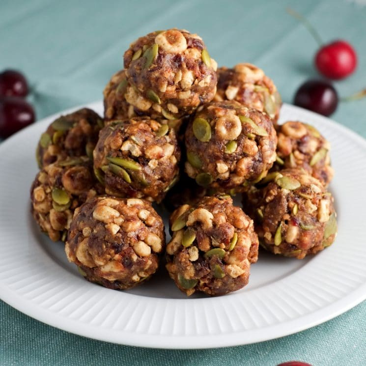 cereal energy bites with cheerios pumpkin seeds and cherries