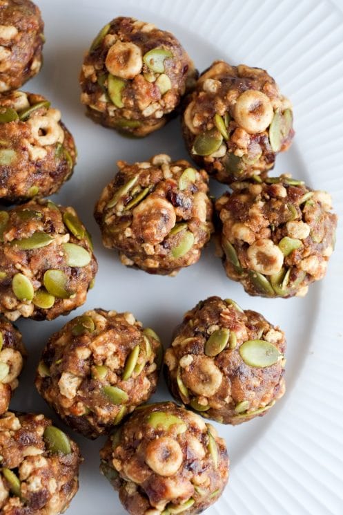 Honey, cherry, and pepita energy bites made with Honey Nut Cheerios.