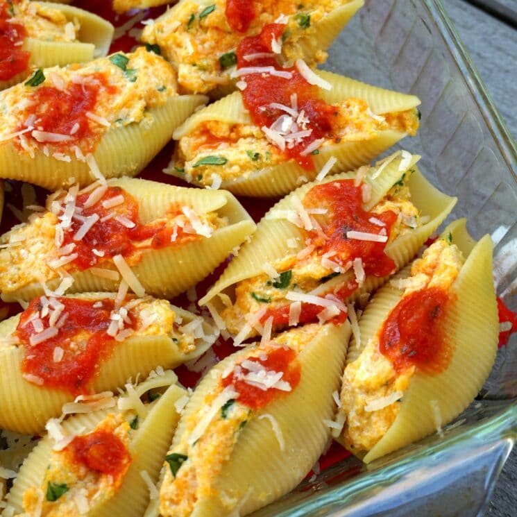 close up stuffed shells in baking dish