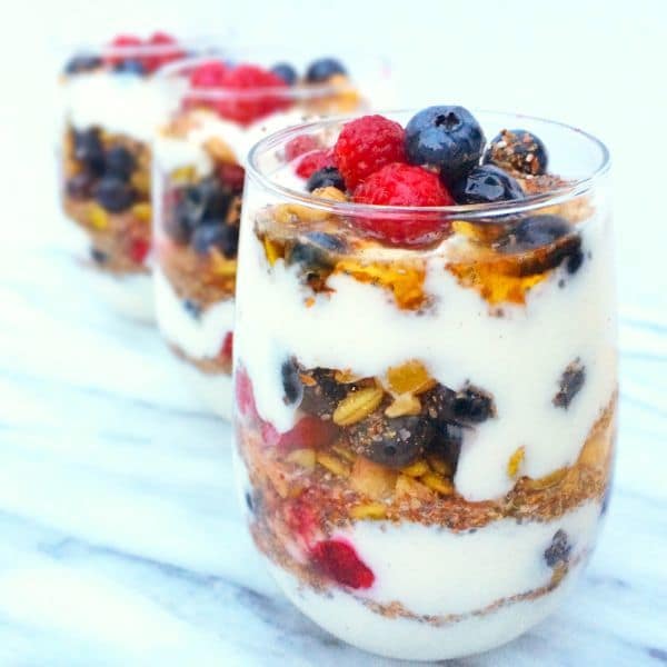 Protein Packed Fruit and Yogurt Parfait with raspberries and blueberries