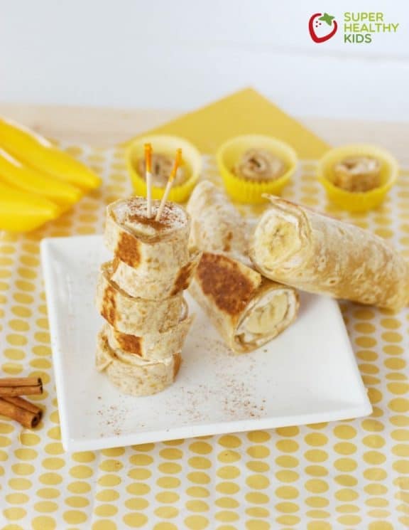 Warm Banana Roll-ups Sliced on a Plate