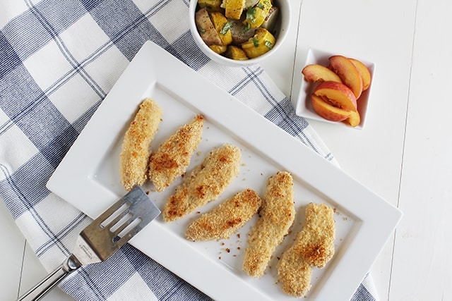 chicken tenders on a white serving plate