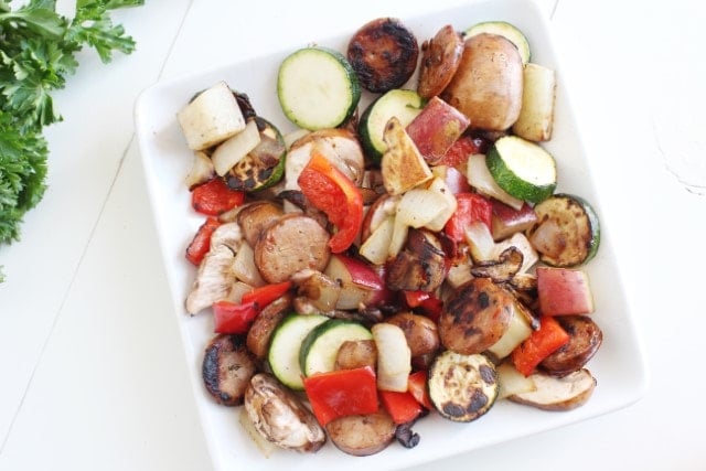 vegetables like zucchini in a sausage skillet