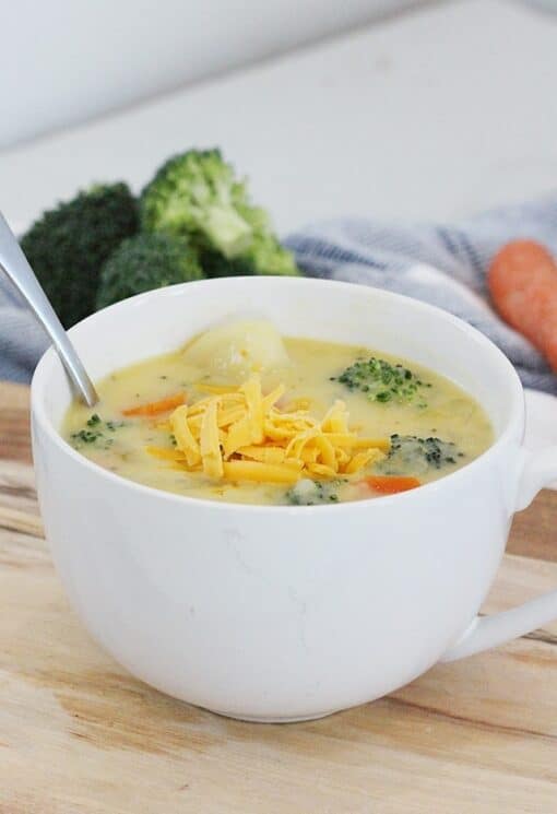 some vegetables in this cheesy soup are carrots, broccoli, potatoes an carrots