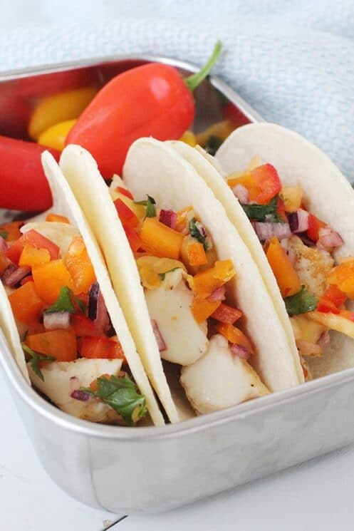 Fish Tacos that are loaded with fresh toppings and a deliciously mild fish for kids to enjoy!