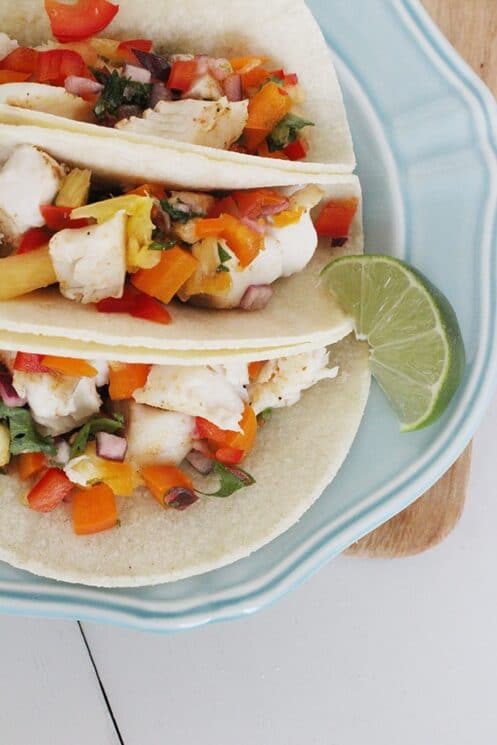 Fish Tacos that are loaded with fresh toppings and a deliciously mild fish for kids to enjoy!
