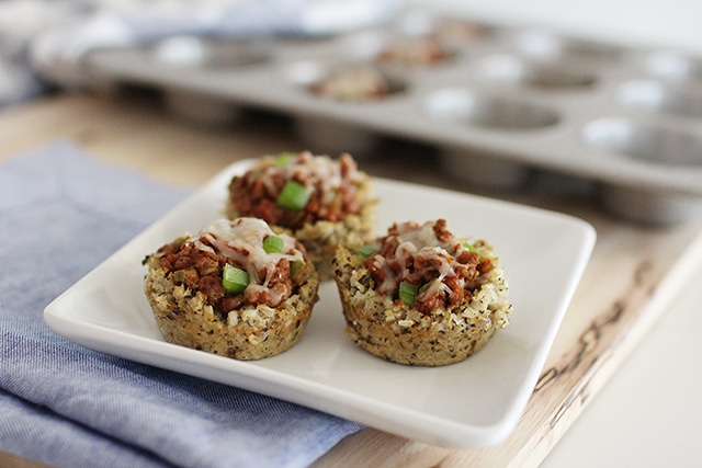 Planning a party, potluck, or play-date? Try these tasty little Cauliflower Pizza Bites for a fun and filling snack stuffed with veggies and a hearty meat sauce. cauliflower pizza bites