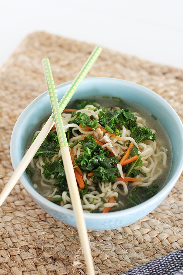 Revamp processed Top Ramen to taste fresher than ever with a gingery broth and loads of fresh mushrooms, carrots, and greens. Make it in minutes in a single pot! Homemade Top Ramen in a bowl with chopsticks