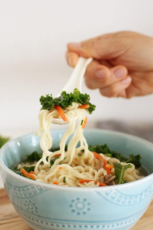 bowl of homemade top ramen with kale and carrots