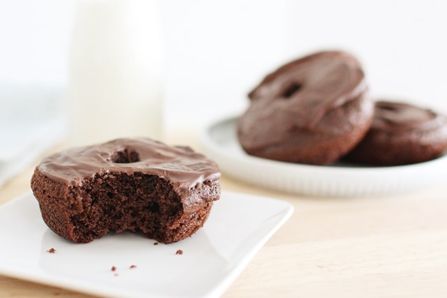 homemade chocolate donut with bite taken out