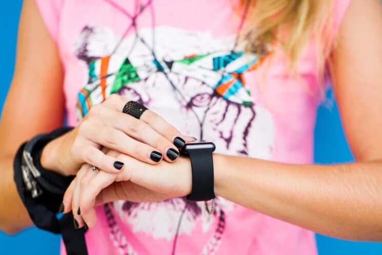 teen wearing a fitness tracker