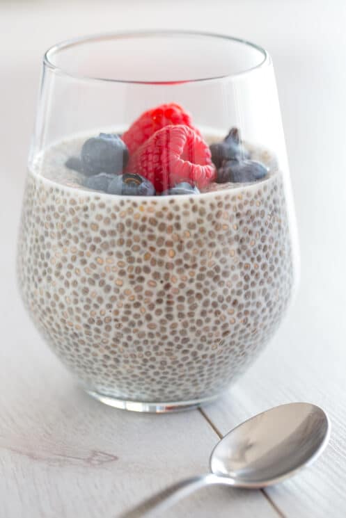 chia pudding in a glass with fresh berries