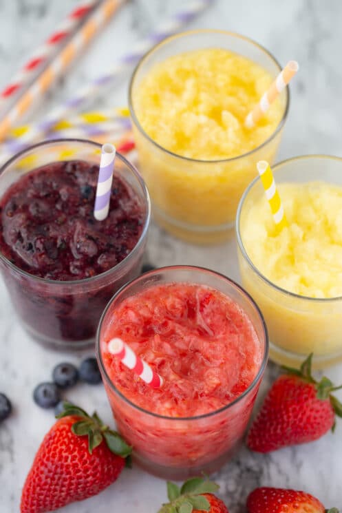 real whole fruit slushies in glasses with straws