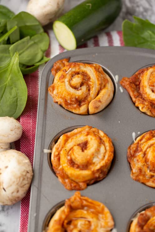 veggie packed pizza rolls in muffin tin