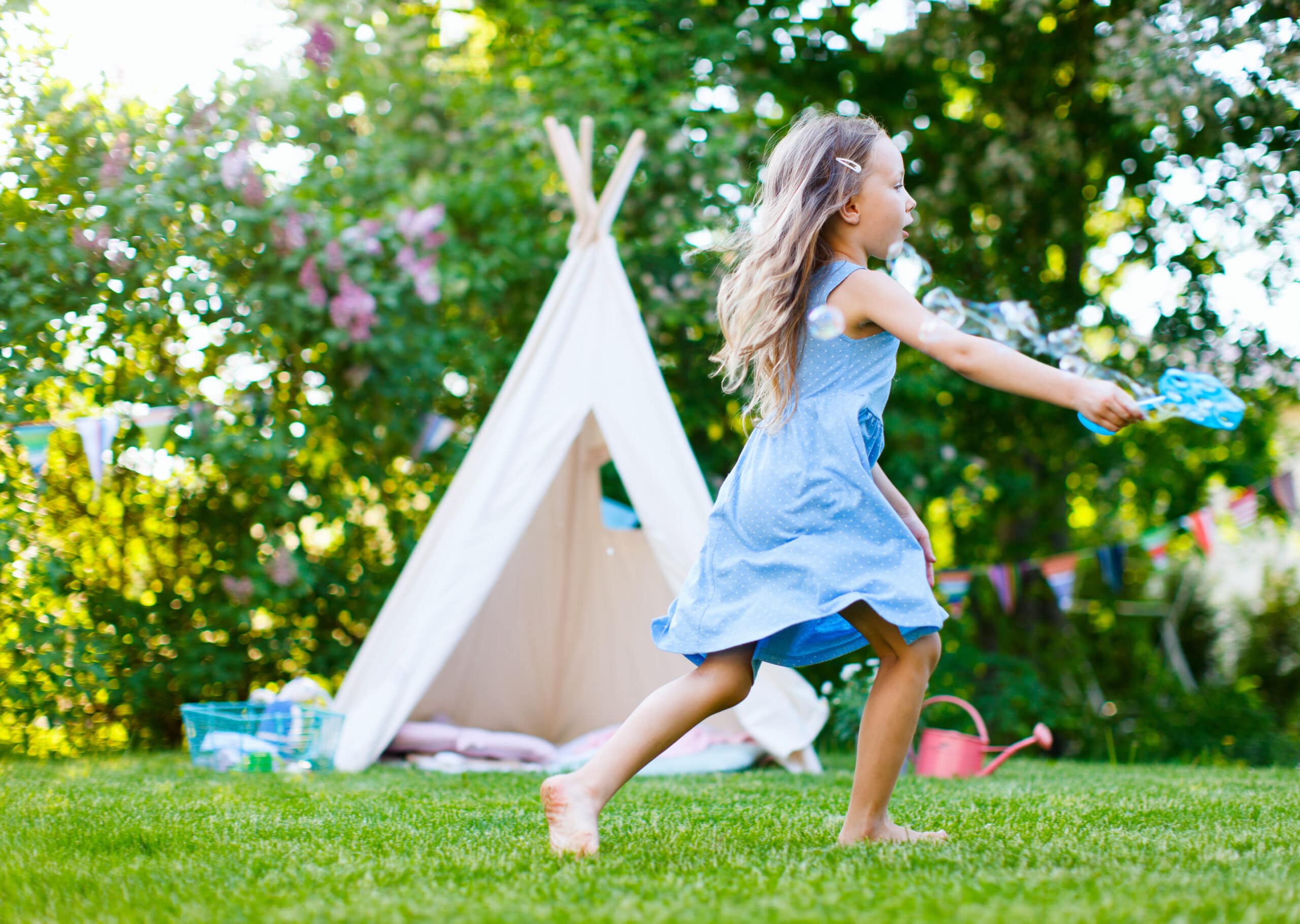 Group of five happy children jumping outdoors., Group of fi…