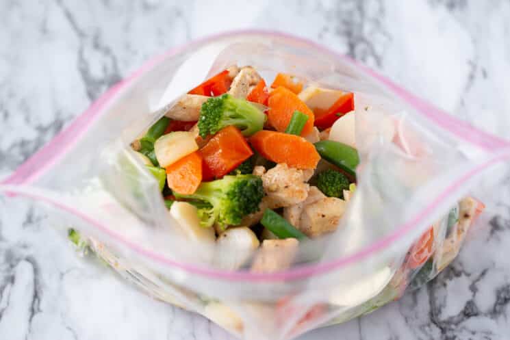 ziplock bag of cooked chicken and veggies for the freezer