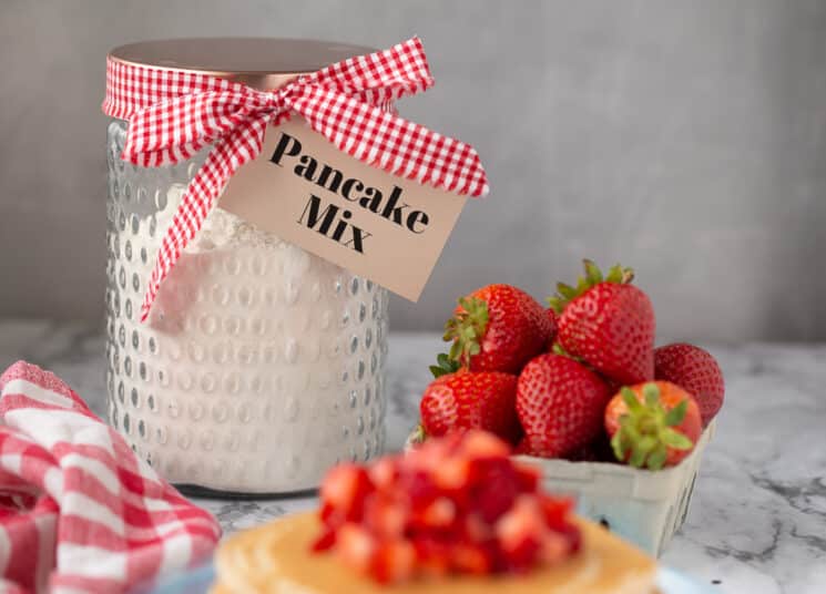 jar of homemade pancake mix with fresh berries