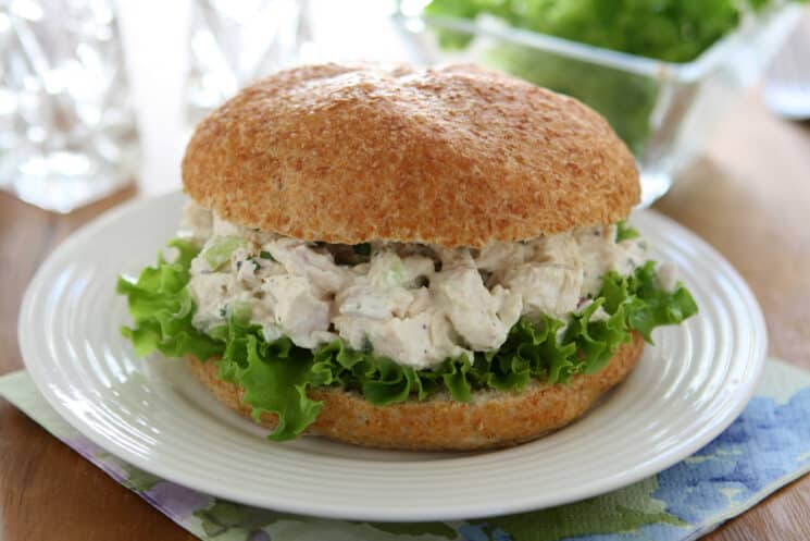 chicken salad sandwich on a bun with lettuce