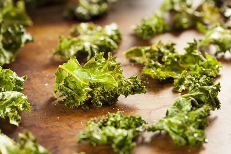 roasted kale chips on a pan, freshly made