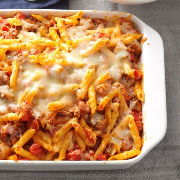 cheesy casserole featuring ziti and tomato sauce