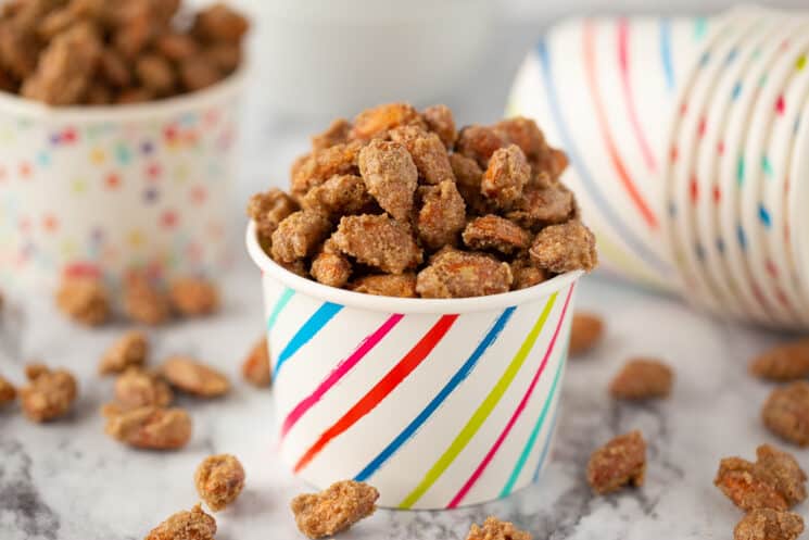 candied almonds in a colorful paper cup