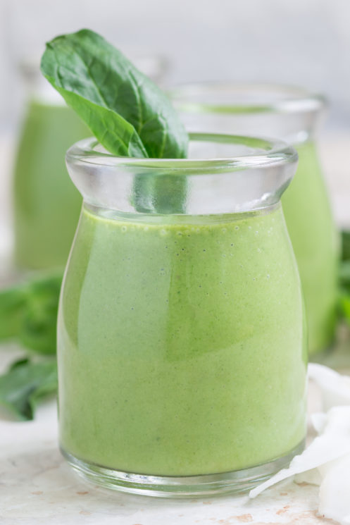 close up of a healthy green smoothie as a makeover of a shamrock shake with a mint leaf