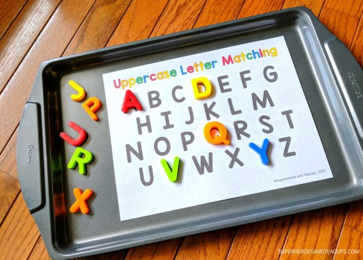 magnetic letters on cookie sheet make a good indoor activity for kids