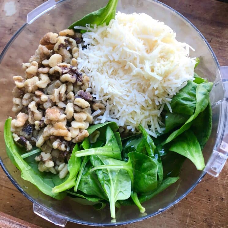 spinach, walnuts, and cheese in a food processor