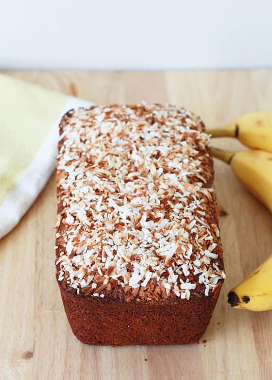 Coconut Banana Bread Loaf with toasted coconut on top