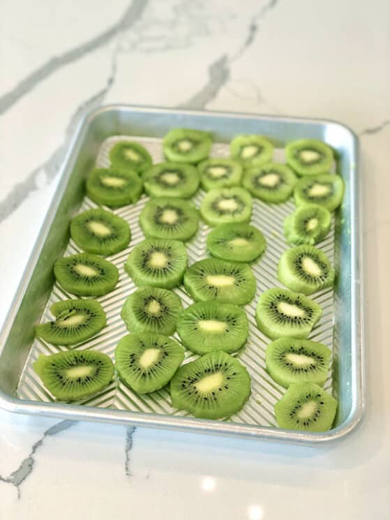 Kiwi Sorbet 2 Sliced kiwis on a tray