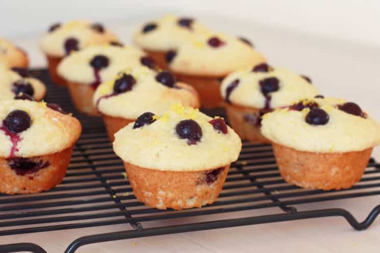 lemon blueberry muffins on a cooling wrack