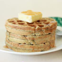 stack of 3 zucchini waffles on a plate