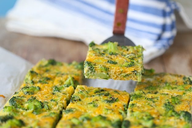 broccoli egg bar being lifted from the pan