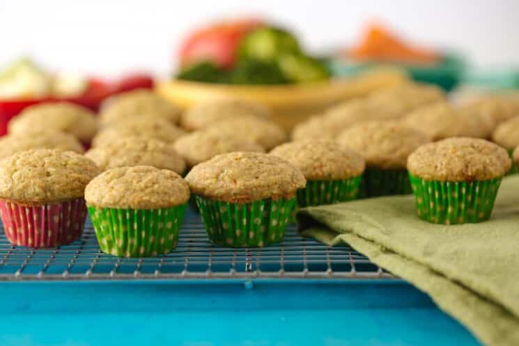 many healthy mini muffins cooling on a rack