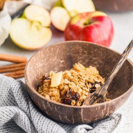 Apple cinnamon baked oatmeal in a wooden bowl