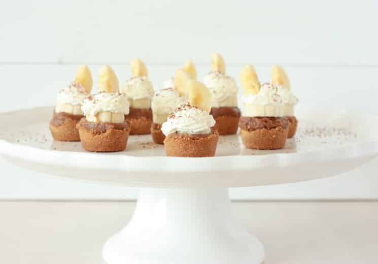 banoffee pie bites on a white cake plate