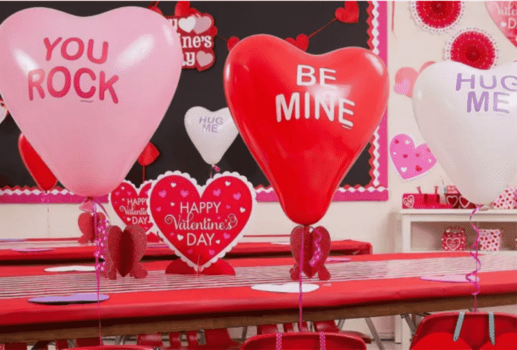 valentines balloons decorating school tables courtesy of Party City