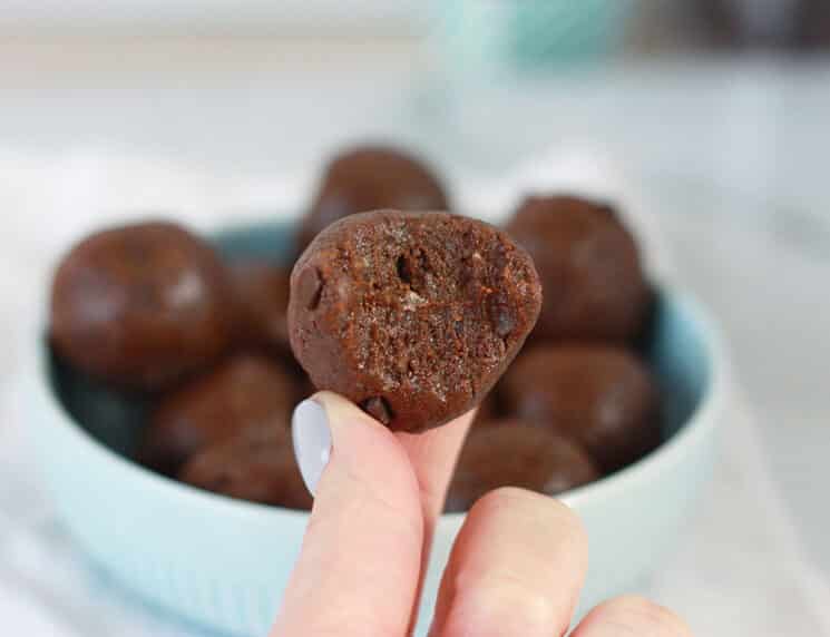 brownie batter protein bite up close with a bite taken out