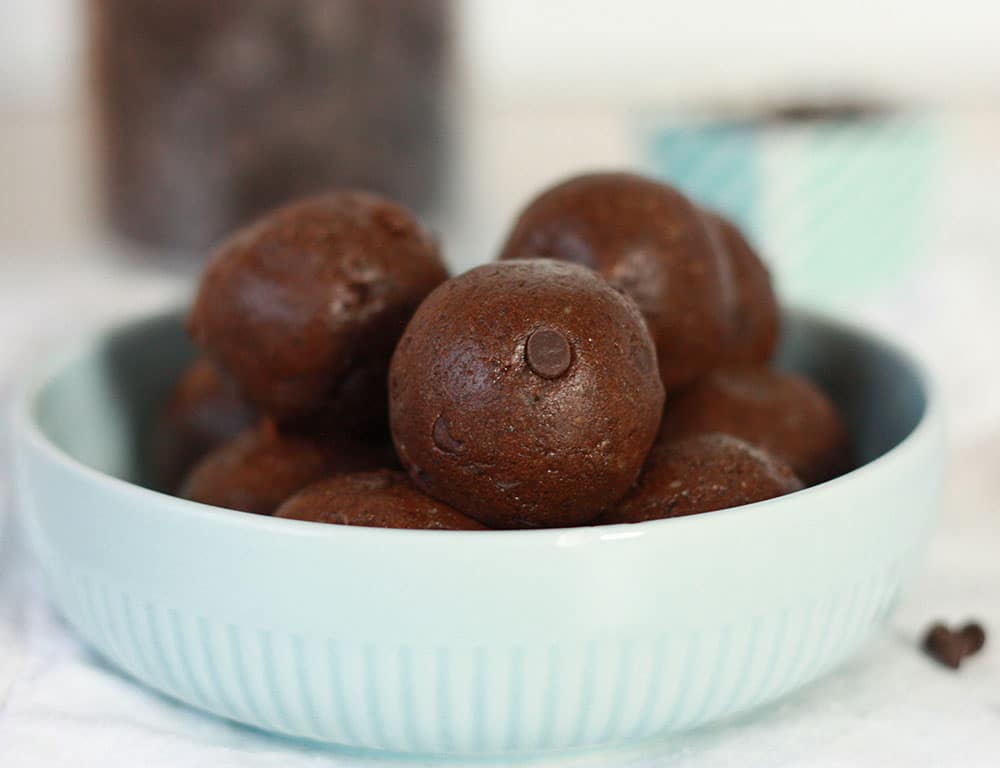 double fudge brownie batter bites in a blue bowl