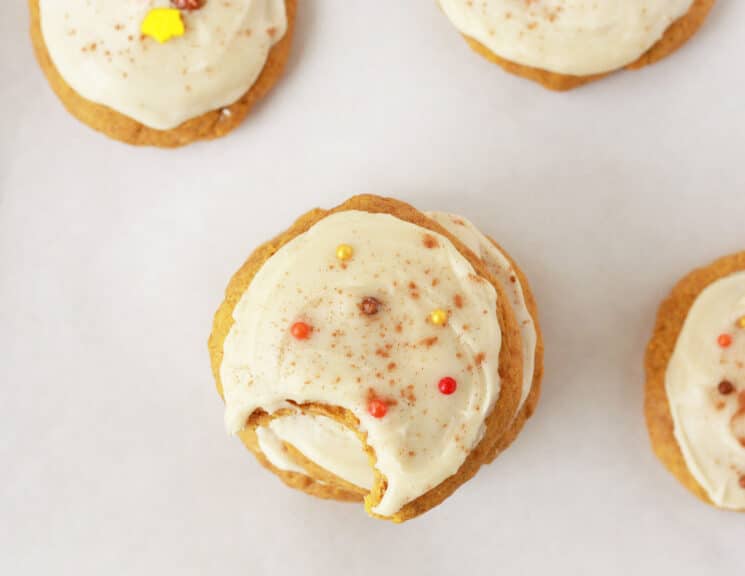 top view of soft pumpkin cookies with maple glaze
