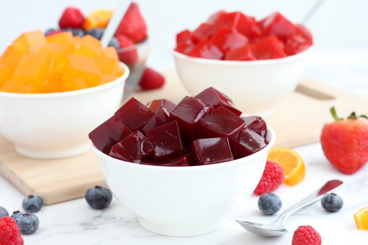 bowls of healthy homemade jello in different flavors