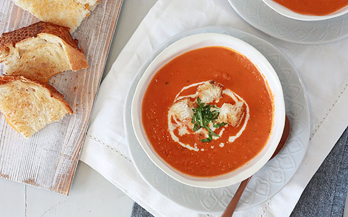 creamy tomato basil soup with grilled cheese sandwiches