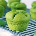 closeup view of sweet spinach muffins on a cooling rack
