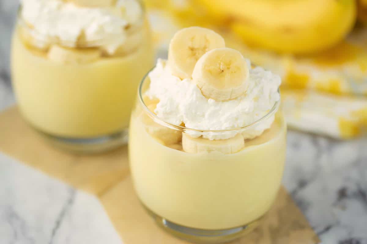 homemade banana pudding from scratch with layered bananas and whip cream