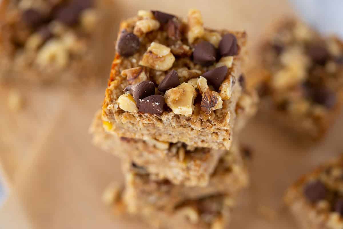 3 ingredient peanut butter banana snack bars cut into squares in a stack. 