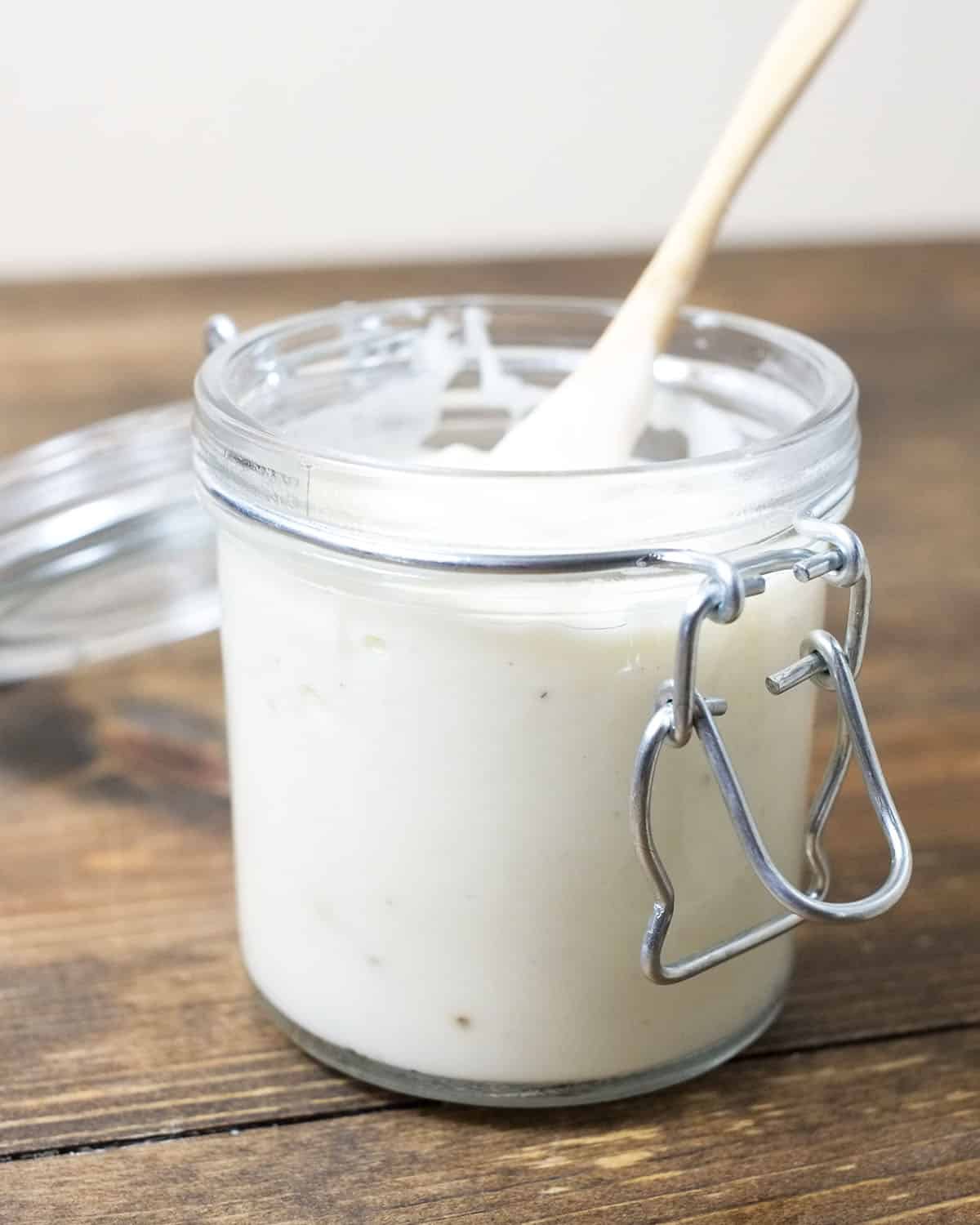 cream of chicken soup in a mason jar with a lid on a wood background