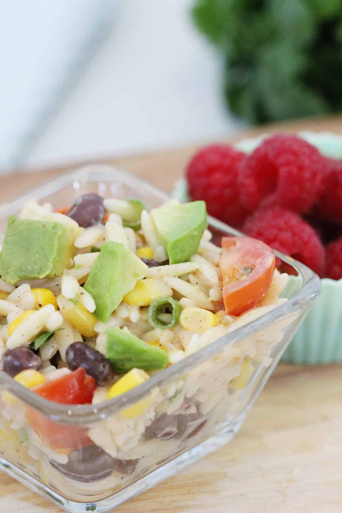 close up of avocado salad in a glass bowl