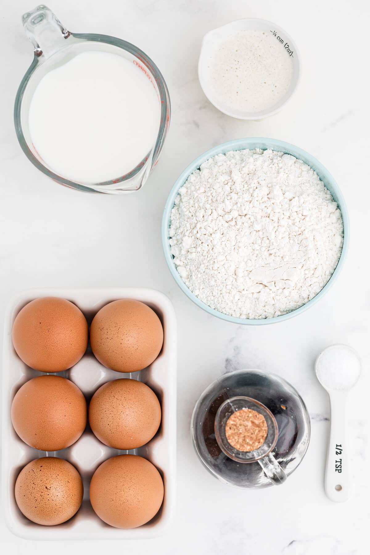 Ingredients for popovers: flour, milk, eggs, vanilla, coconut oil, salt