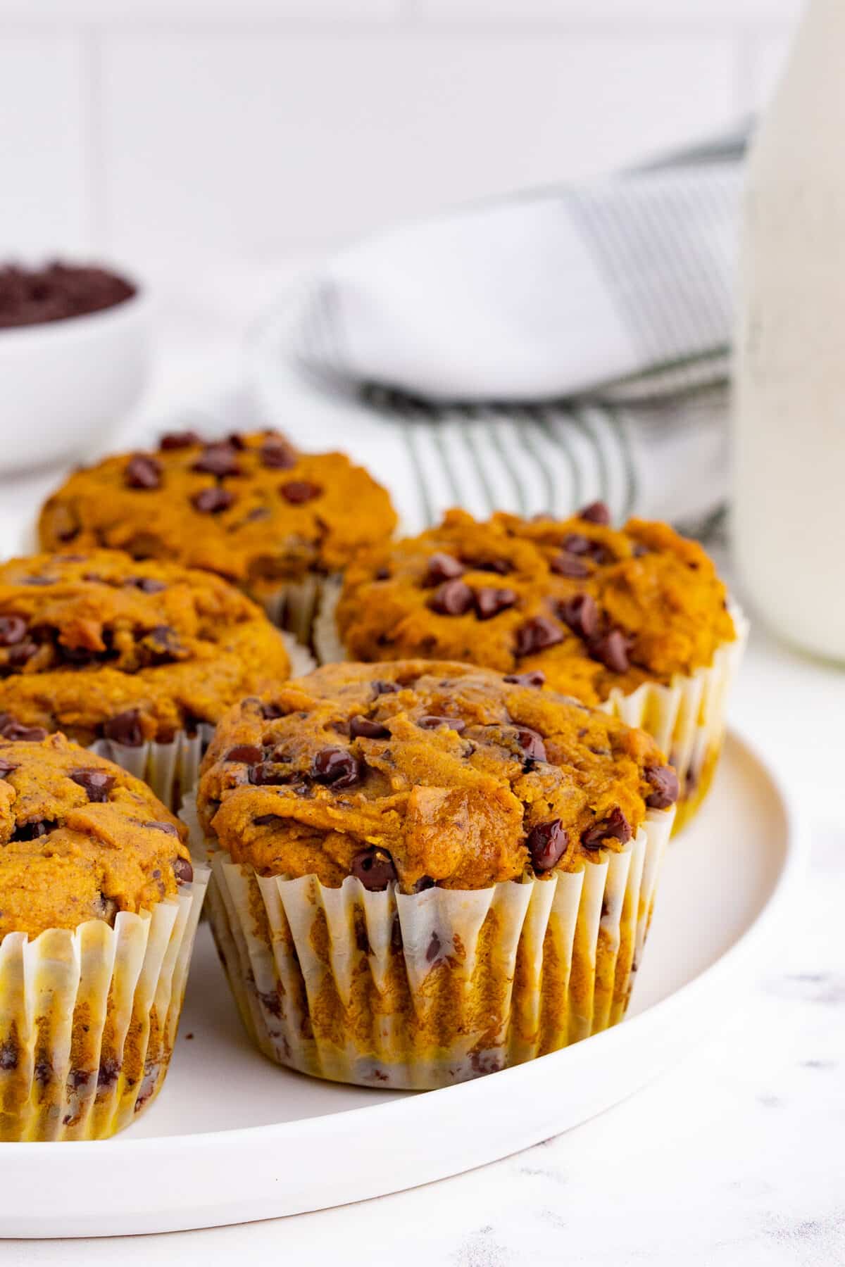 pumpkin muffins on a white plate